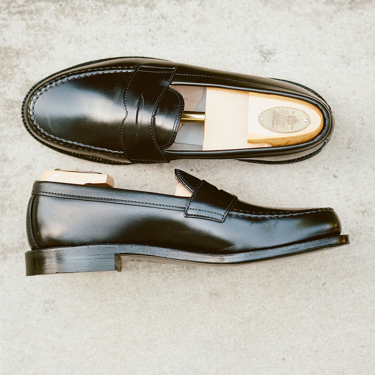073-alden-penny-loafer-black-top-side.jpg